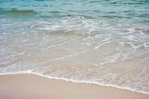 a close up of a wave on a beach jigsaw puzzle