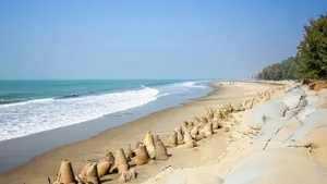 a sandy beach next to a body of water jigsaw puzzle