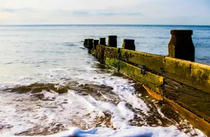 a large stone structure in the water jigsaw puzzle