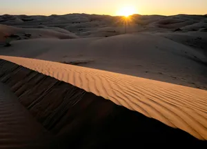 Sunrise over rippled desert sand dunes jigsaw puzzle