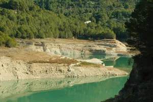 Beautiful view of Guadalest Reservoir with forests and reflections in Comunidad Valenciana, Spain. jigsaw puzzle