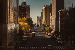 Captivating view of a bustling New York City street bathed in morning light, showcasing urban life. jigsaw puzzle