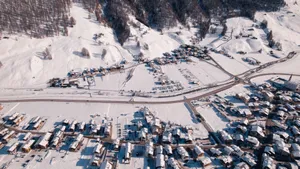 Stunning aerial view of a snow-covered village in Livigno, Italy during winter. jigsaw puzzle