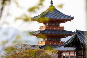 Beautiful view of Kiyomizu-dera Temple's pagoda with cherry blossoms in Kyoto, Japan. jigsaw puzzle