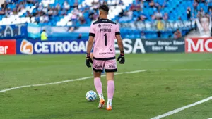 Goalkeeper in action during a football game on a sunny day outdoors. jigsaw puzzle
