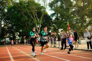 A diverse group of runners participating in an outdoor marathon event in a lively atmosphere. jigsaw puzzle