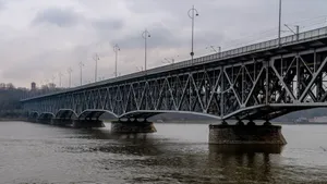 Steel bridge spanning the Vistula River in Płock, Poland, showcasing modern architecture. jigsaw puzzle