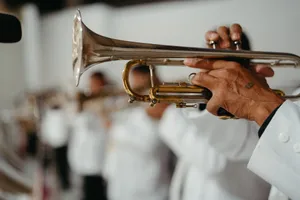 A musician elegantly playing a trumpet in a band, capturing the art of music performance. jigsaw puzzle