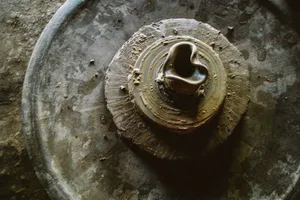 Top view of a pottery wheel shaping a heart in clay, evoking creativity. jigsaw puzzle